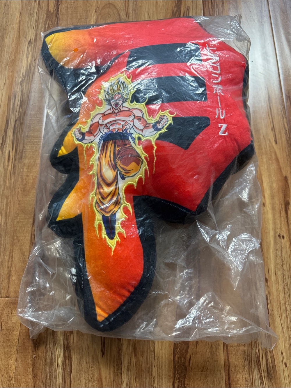 Primitive Black Plush Character Pillow with Red Accent